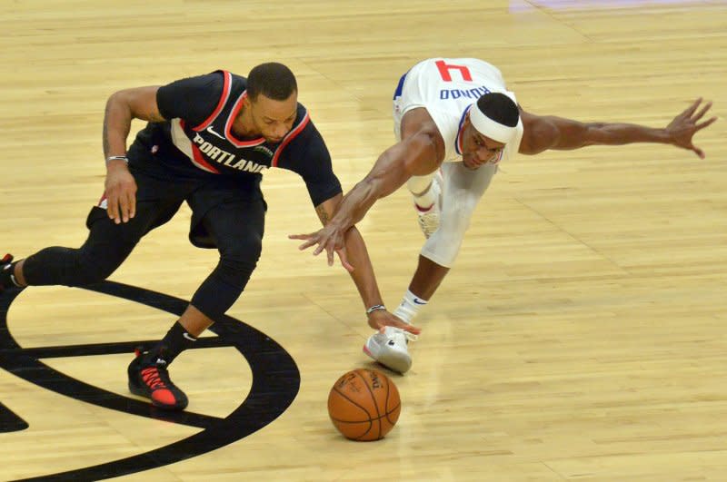 Former NBA guard Rajon Rondo (R) spent his final season with the Los Angeles Lakers and Cleveland Cavaliers. File Photo by Jim Ruymen/UPI