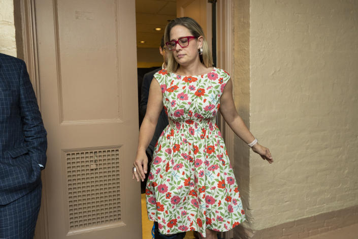 FILE - Sen. Kyrsten Sinema, D-Ariz., leaves a closed-door bipartisan infrastructure meeting with a group of senators and White House aides on Capitol Hill in Washington, June 22, 2021. Sinema received a $1 million surge of campaign cash over the past year from private equity professionals, hedge funds and venture capitalists whose interests she has staunchly defended in Congress. That's according to an Associated Press review of campaign finance disclosures. (AP Photo/Manuel Balce Ceneta, File)