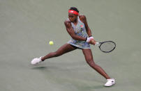 Coco Gauff, of the United States, returns a shot to Anastasia Potapova, of Russia, during the first round of the US Open tennis tournament Tuesday, Aug. 27, 2019, in New York. (AP Photo/Julie Jacobson)