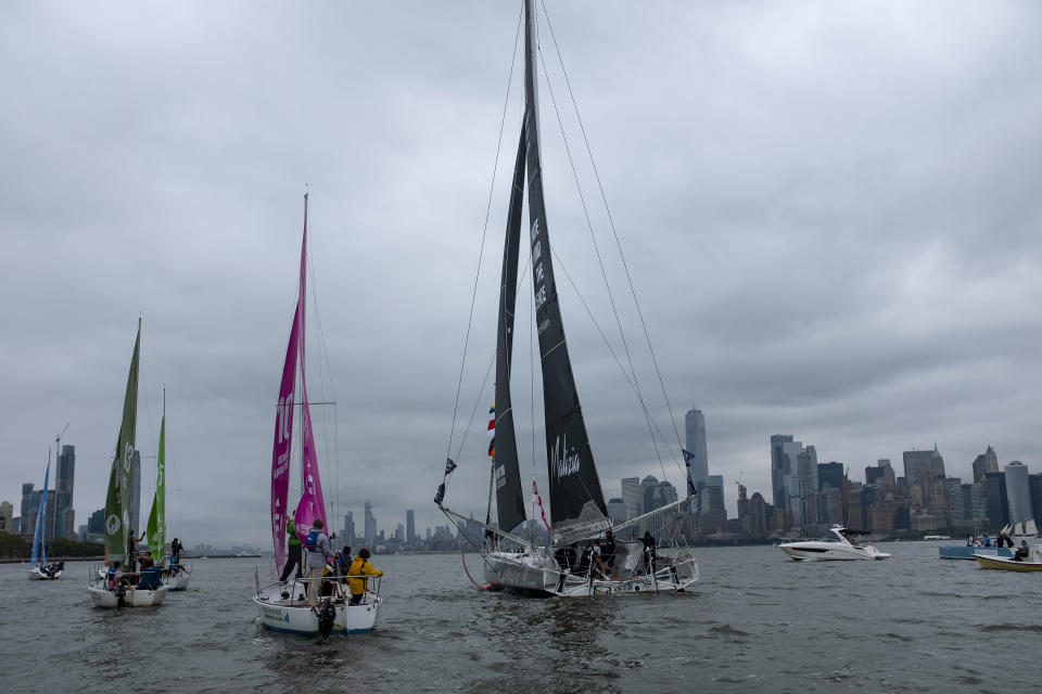 Greta Thunberg, a 16-year-old Swedish climate activist, sails into New York harbor aboard the Malizia II, Wednesday, Aug. 28, 2019. The zero-emissions yacht left Plymouth, England on Aug. 14. She is scheduled to address the United Nations Climate Action Summit on Sept. 23 (AP Photo/Craig Ruttle)