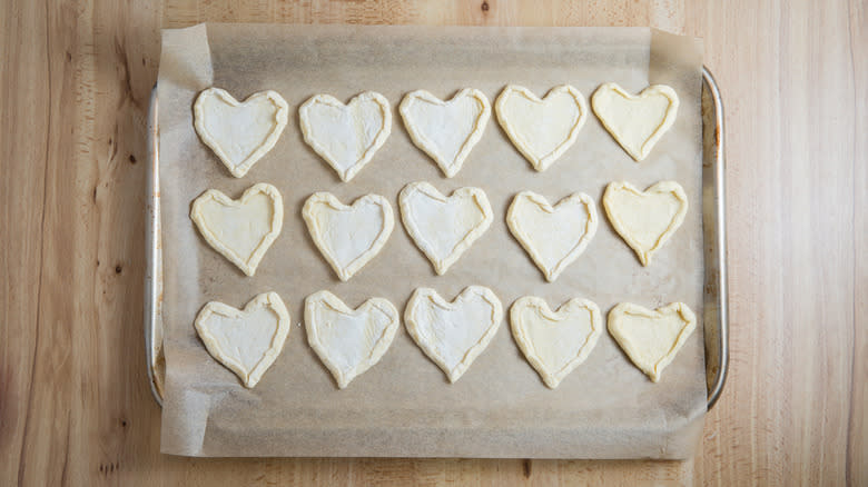 many heart shaped dough pieces