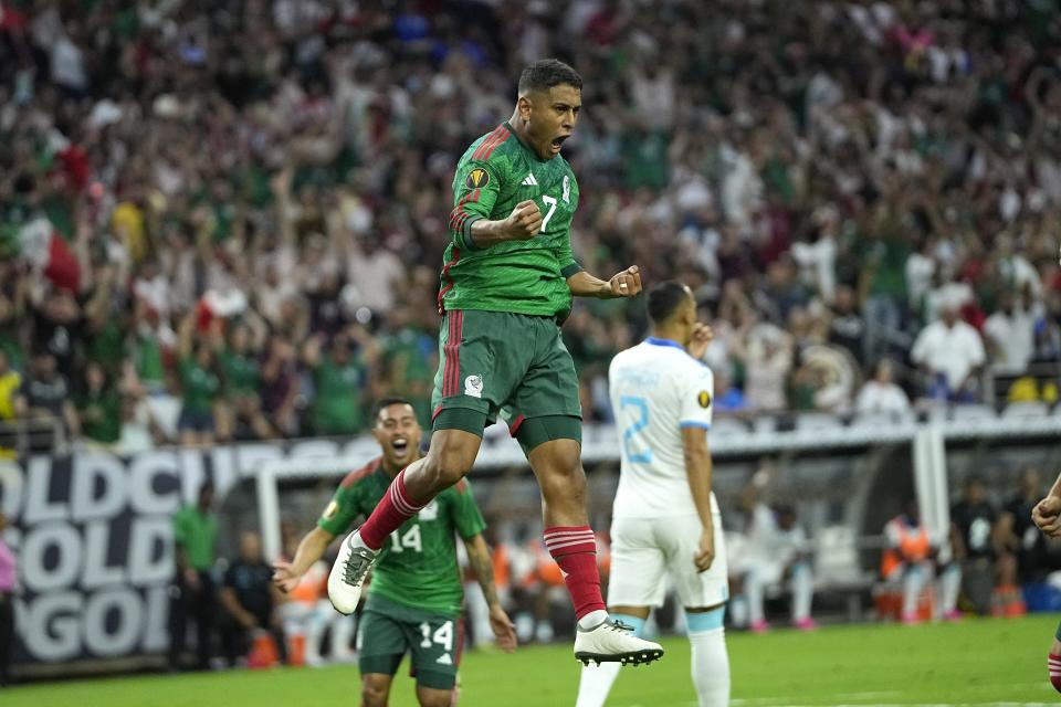 Mexico's Luis Romo (7) celebrates after scoring a goal against the Honduras during the first half of a CONCACAF Gold Cup soccer match Sunday, June 25, 2023, in Houston. (AP Photo/David J. Phillip)