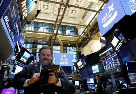 A trader works on the floor of the New York Stock Exchange (NYSE) in New York, U.S., March 30, 2017. REUTERS/Brendan McDermid