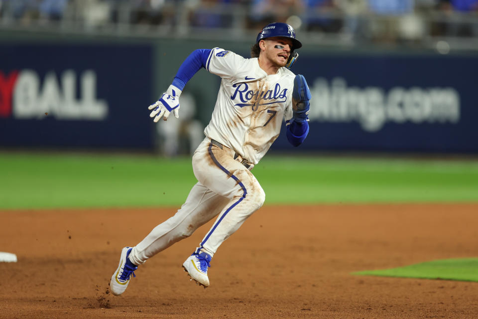 KANSAS CITY, MO - OCTOBER 9: Kansas City Royals shortstop Bobby Witt Jr. (7) runs in on a single from catcher Salvador Perez (13) in the eighth inning of Game 3 of the ALDS between the New York Yankees and Kansas third base City Royals on October 9, 2024 at Kauffman Stadium in Kansas City, MO. (Photo by Scott Winters/Icon Sportswire via Getty Images)