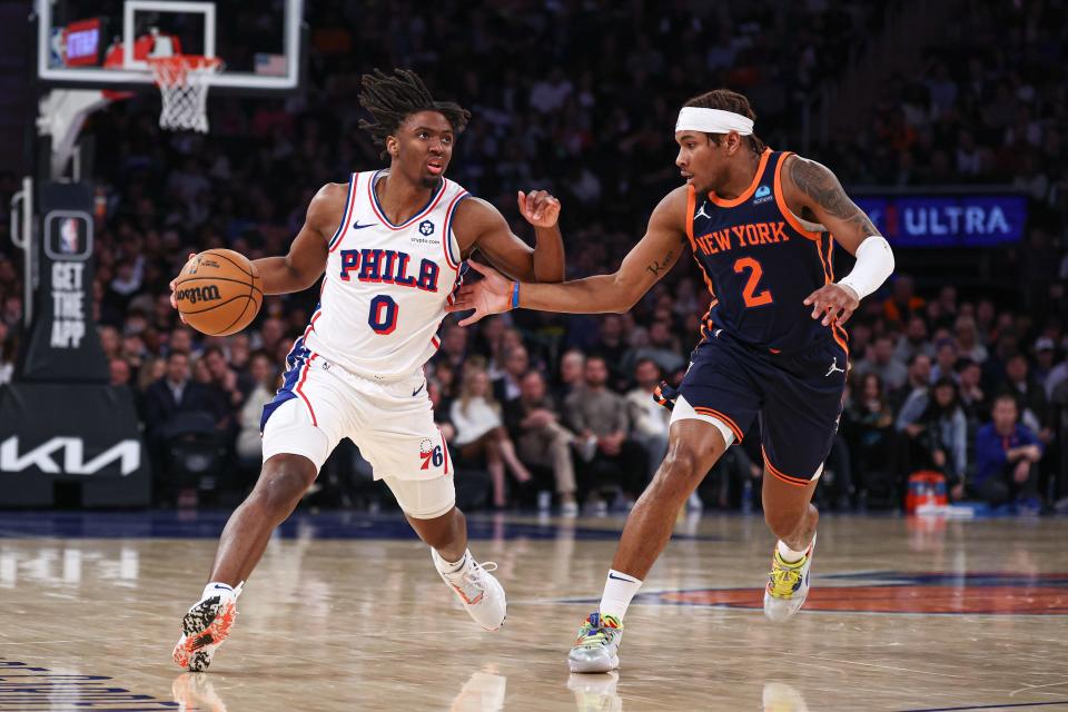 Mar 12, 2024; New York, New York, USA; Philadelphia 76ers guard Tyrese Maxey (0) is guarded by New York Knicks guard Miles McBride (2) during the second quarter at Madison Square Garden. Mandatory Credit: Vincent Carchietta-USA TODAY Sports
