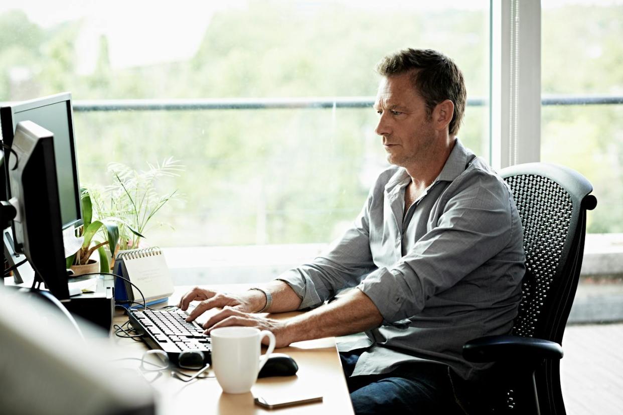 Researchers have long known that sitting at your desk hour after hour is an unhealthy habit. <a href="https://www.gettyimages.com/detail/photo/business-man-working-on-computer-royalty-free-image/475967873?phrase=sitting%20at%20desk&adppopup=true" rel="nofollow noopener" target="_blank" data-ylk="slk:Morsa Images/Digital Vision via Getty Images;elm:context_link;itc:0;sec:content-canvas" class="link ">Morsa Images/Digital Vision via Getty Images</a>