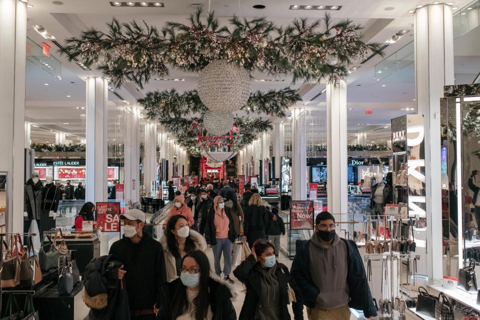 Holiday shoppers make a last-minute trip to department stores in Midtown Manhattan on Dec. 24, 2020. - Credit: Scott Heins/Getty Images