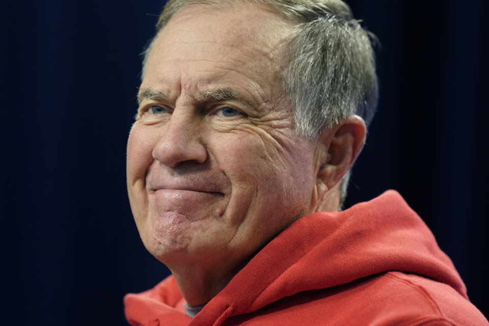 New England Patriots head coach Bill Belichick smiles while taking questions from reporters before an NFL football practice, Wednesday, Sept. 21, 2022, in Foxborough, Mass. (AP Photo/Steven Senne)