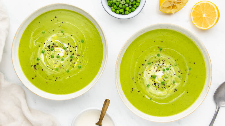 two bowls of pea and mint soup