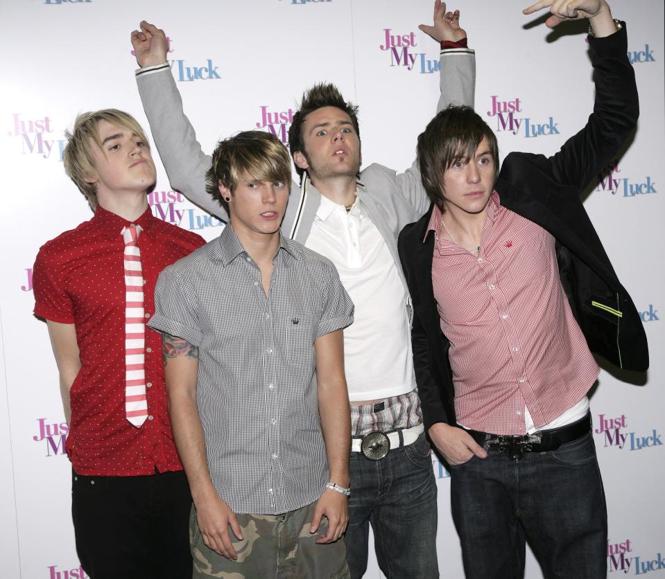 LONDON - JUNE 28: McFly members (L-R) Tom Fletcher, Dougie Poynter, Harry Judd and Danny Jones arrive at the UK Charity Premiere of "Just My Luck" at Vue West End, Leicester Square on June 28, 2006 in London, England. (Photo by Dave Hogan/Getty Images)