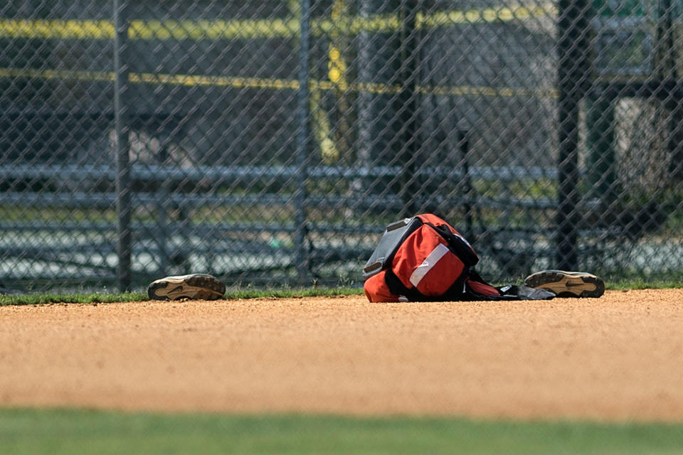 <p>A view of shoes left at a baseball field after a shooting during a practice of the Republican congressional baseball at Eugene Simpson Statium Park June 14, 2017 in Alexandria, Va. (Photo: Brendan Smialowski/AFP/Getty Images) </p>