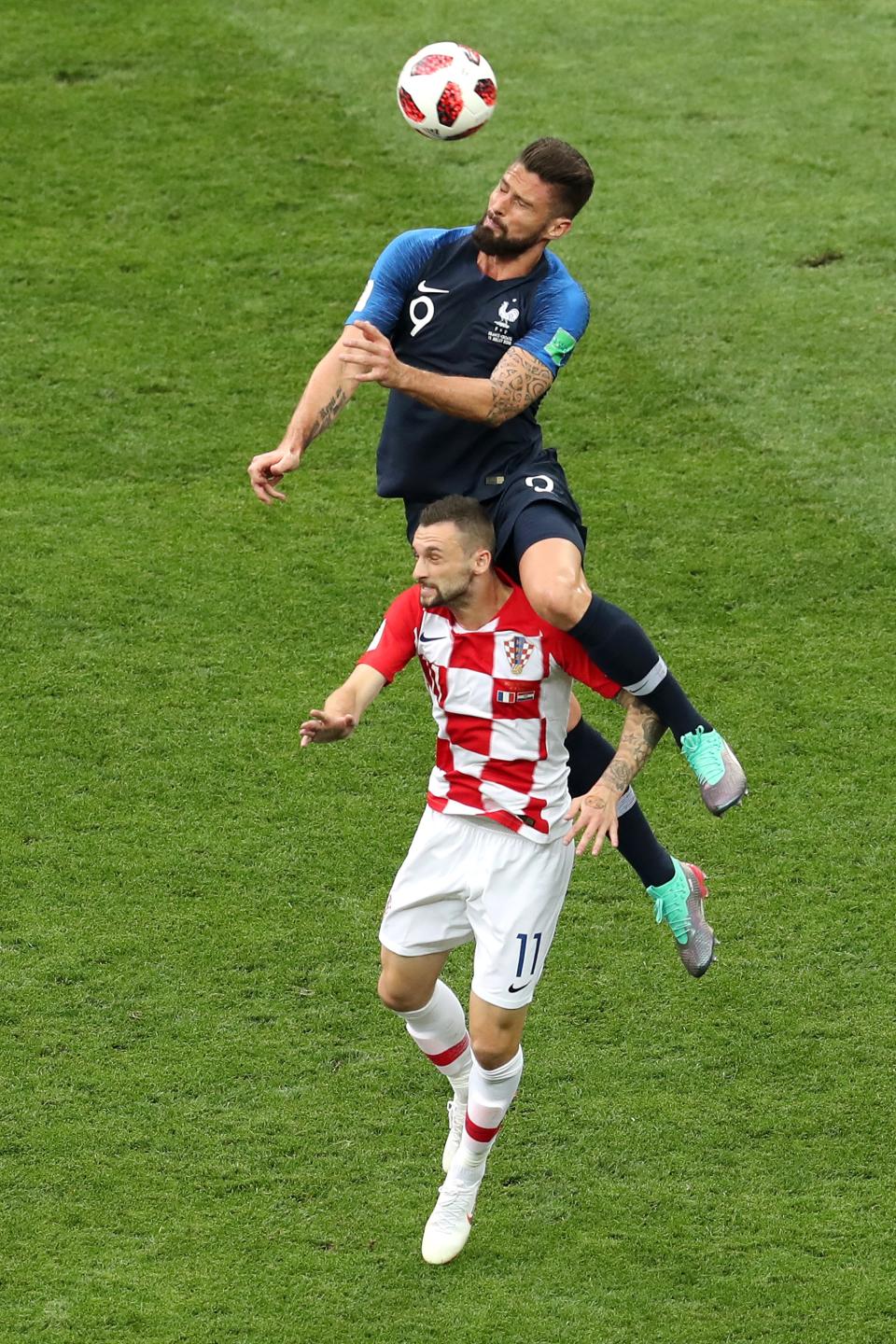 <p>Olivier Giroud of France wins a header from Marcelo Brozovic of Croatia. (Photo by Catherine Ivill/Getty Images) </p>