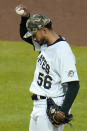 Pittsburgh Pirates relief pitcher Duane Underwood Jr. collects himself after giving up a solo home run to San Francisco Giants' Brandon Crawford during the eighth inning of a baseball game in Pittsburgh, Friday, May 14, 2021. (AP Photo/Gene J. Puskar)