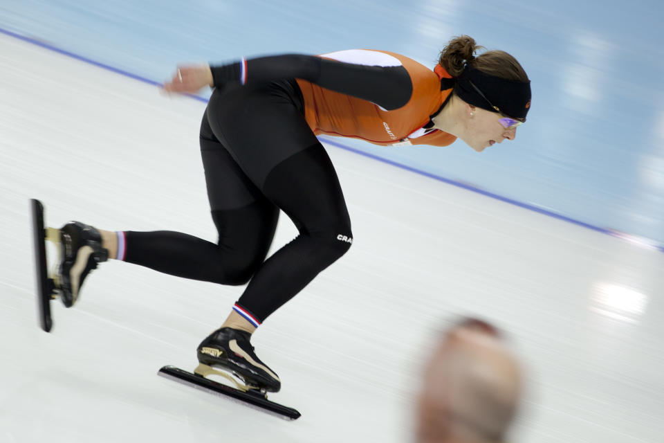 Speedskater Ireen Wust of the Netherlands trains at the Adler Arena Skating Center during the 2014 Winter Olympics in Sochi, Russia, Thursday, Feb. 6, 2014. (AP Photo/Peter Dejong)