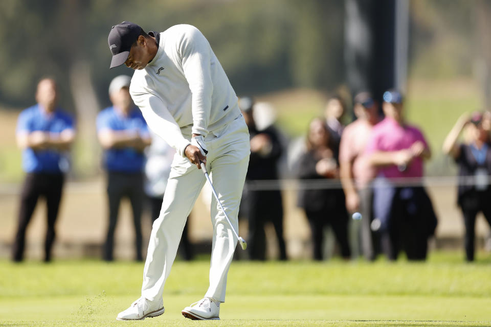 Tiger Woods hits from the 11th fairway during the first round of the Genesis Invitational golf tournament at Riviera Country Club, Thursday, Feb. 15, 2024, in the Pacific Palisades area of Los Angeles. (AP Photo/Ryan Kang)