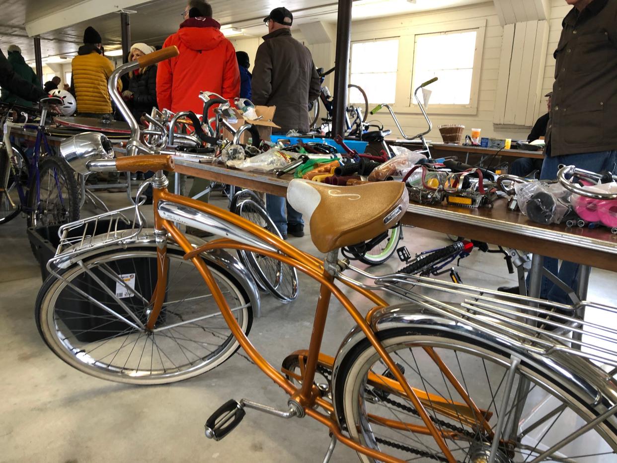 Bikes and accessories line up for shoppers at 2022's bike swap meet at St. Patrick's County Park in South Bend.