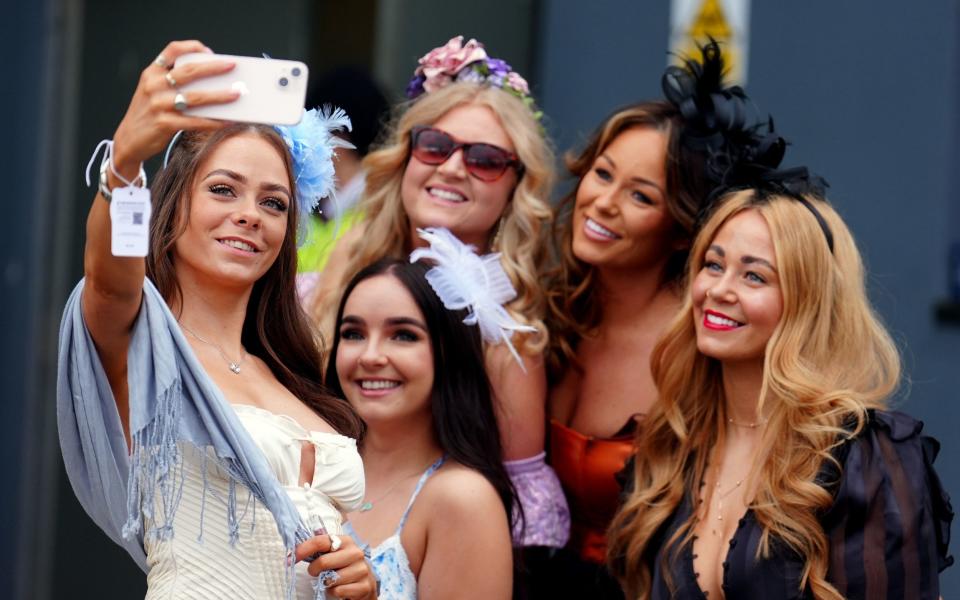 Racegoers take a selfie