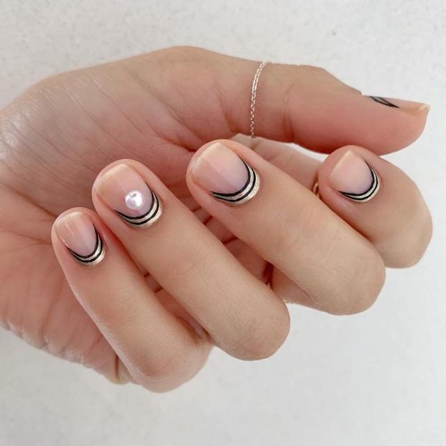 Crescent nails are one of 2019's hottest low-key beauty trends
