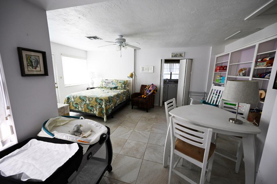 This room is designed to be “mom’s bedroom” at Francis House. It includes a queen size bed, is adjacent to the laundry area and opens to a fenced-in backyard, where older children can play. Each new mom receives a new pack and play (foreground) for their baby that they take with them when they leave the program.