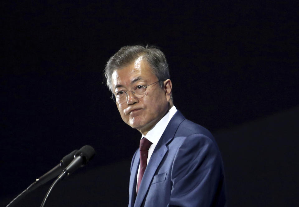 South Korean President Moon Jae-in listens to a question during a press conference after returning from North Korea at the main press center in Seoul, South Korea, Thursday, Sept. 20, 2018. The leaders of the rival Koreas took to the road for the final day of their summit Thursday, standing on the peak of a beautiful volcano considered sacred in the North and a centerpiece of propaganda used to legitimize the Kim family's rule, their hands clasped and raised in a pose of triumph. Their trip to the mountain on the North Korean-Chinese border, and the striking photo-op that will resonate in both Koreas, followed a day of wide-ranging agreements they trumpeted as a major step toward peace.(AP Photo/Ahn Young-joon)