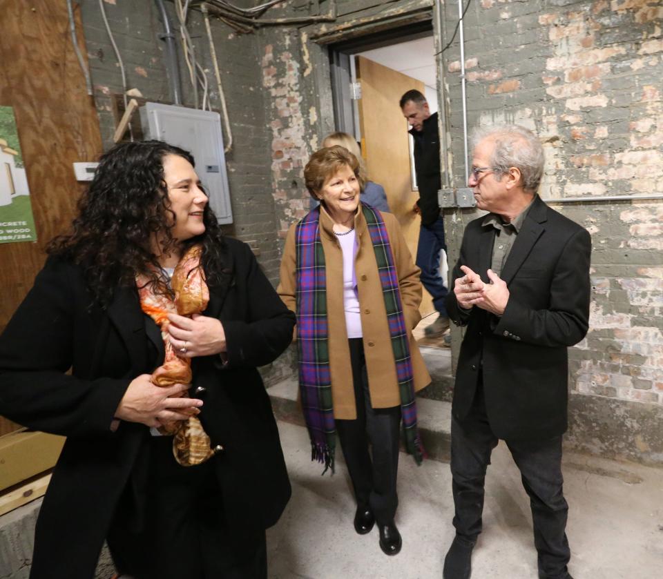 Isabel Casillas Guzman, left, administrator of the U.S. Small Business Administration, Sen. Jeanne Shaheen, D-New Hampshire, and MADCO3D founding partner Dan Bernard tour the Rochester 3D printing company Friday, Dec. 8, 2023.