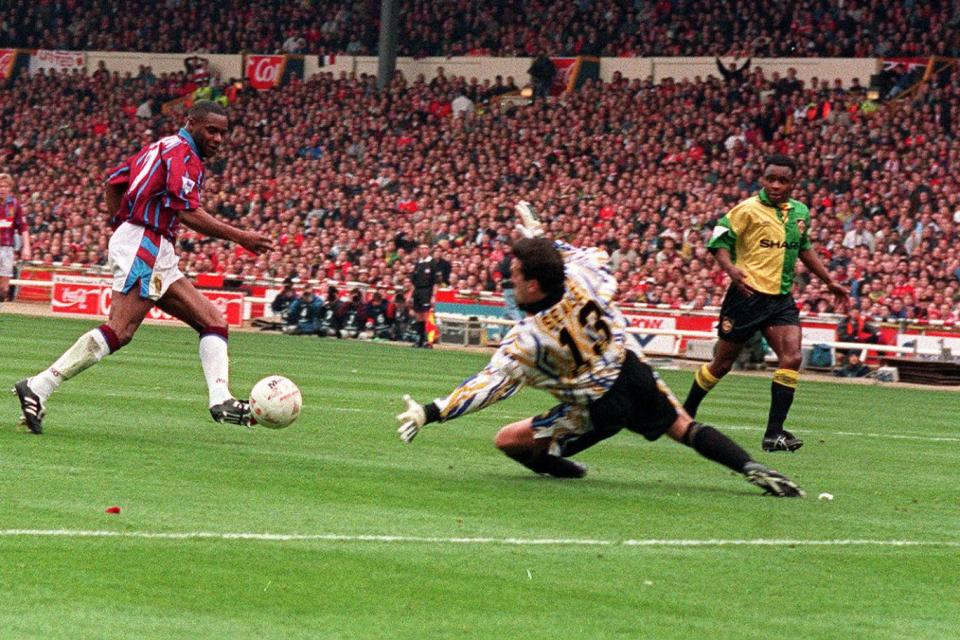 Dalian Atkinson (left) scoring the first goal in the Coca Cola Cup Final at Wembley in March 1994 (Tony Harris/PA Wire)