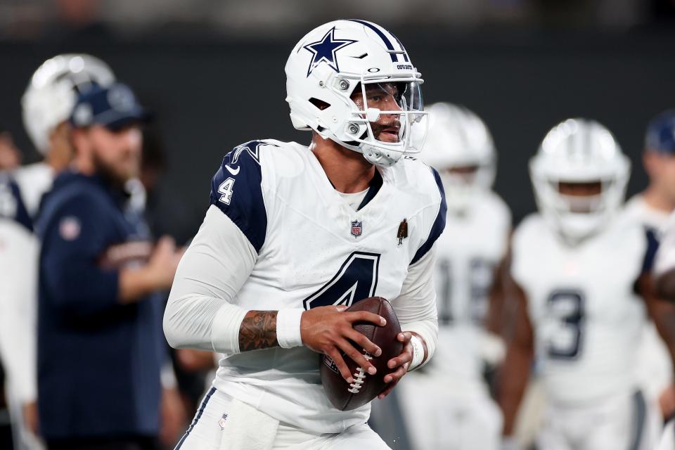 Dak Prescott #4 of the Dallas Cowboys warms up before the game against the New York Giants at MetLife Stadium on September 26, 2024 in East Rutherford, New Jersey.