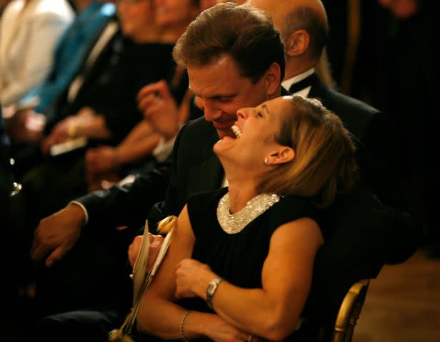 <p>Aude Guerrucci-Pool/Getty</p> Mary Lou Retton and Shannon Kelley laugh during a performance by the Jersey Boys on Oct. 13, 2008, in Washington D.C.