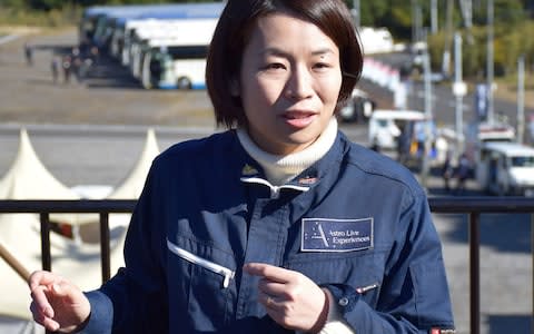 Lena Okajima, chief executive of Japanese space entertainment company ALE, speaks to the media after the Epsilon-4 rocket alunch in Kimotsuki Town - Credit: &nbsp;JIJI PRESS/AFP