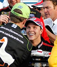 Despite winning the Daytona 500, Trevor Bayne (right) isn't the points leader. Carl Edwards, who is congratulating him on his win, is