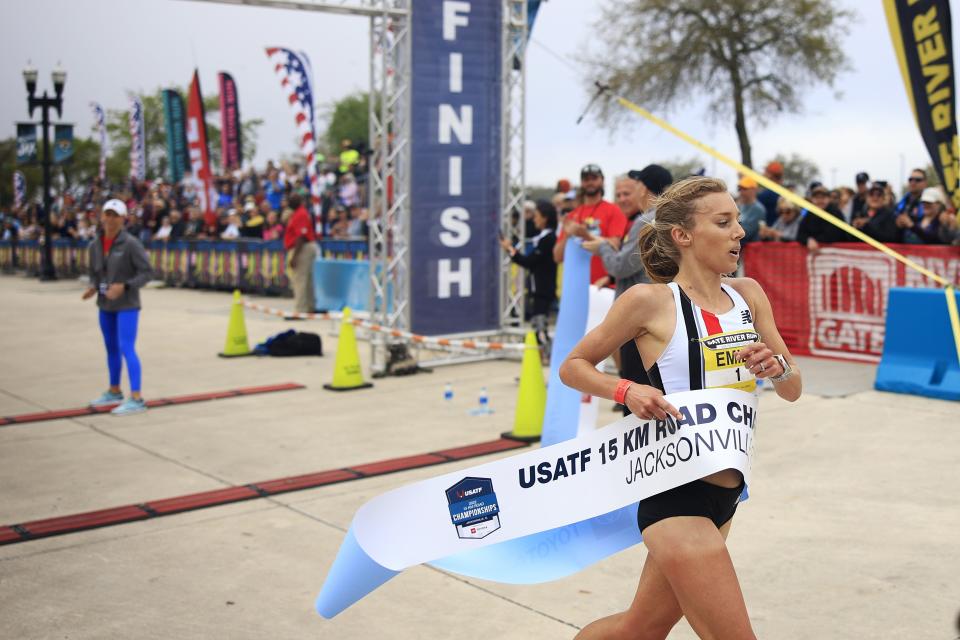 Emily Sisson crosses the finish line to win the 2022 Gate River Run. Sisson is returning in pursuit of a third consecutive victory.