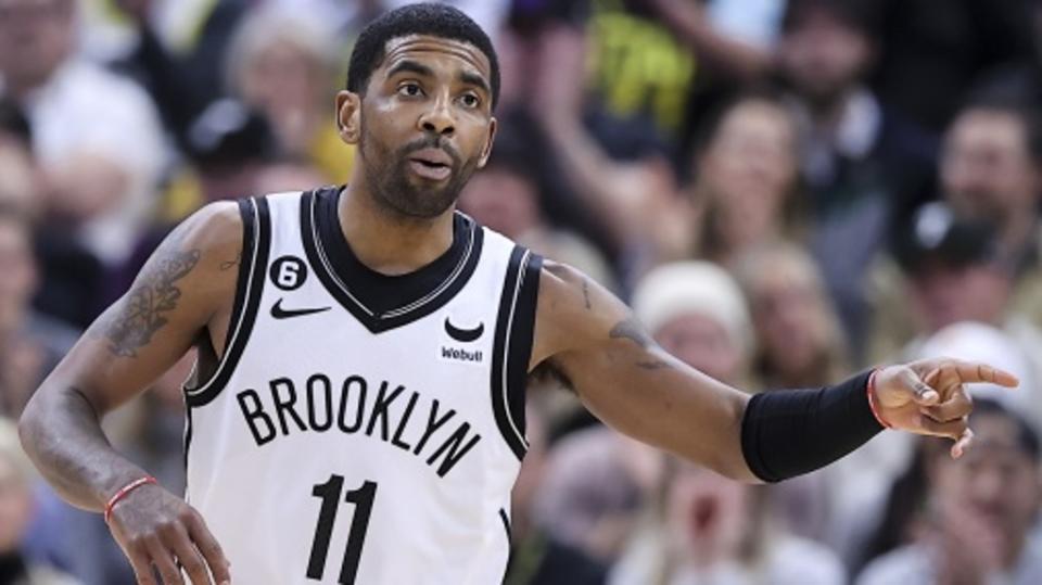 Brooklyn Nets guard Kyrie Irving (11) reacts to a play against the Utah Jazz in the fourth quarter at Vivint Arena