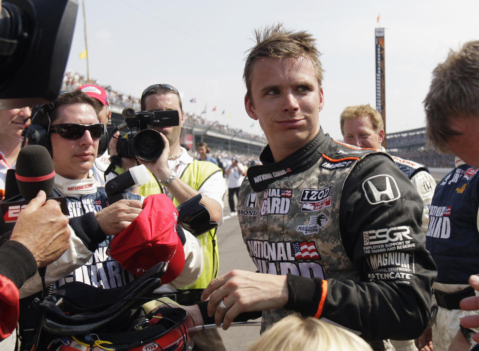 FILE - Dan Wheldon, of England, speaks with reporters after finishing in second place in the Indianapolis 500 auto race at Indianapolis Motor Speedway on May 30, 2010, in Indianapolis. The memory of Wheldon driver hung over Las Vegas Motor Speedway, Sunday, Oct. 16, 2022, on the 11th anniversary of his fatal crash as NASCAR opened the third round of its playoffs at the track. It marked the first time a major race has been held at Las Vegas on the anniversary of Wheldon's 2011 death. (AP Photo/Jeff Roberson, File)