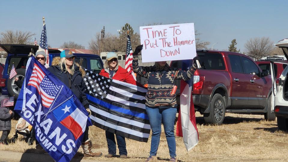 Excited supporters Saturday turn out to support the "People's Convoy" near the Starlight Ranch in Amarillo.