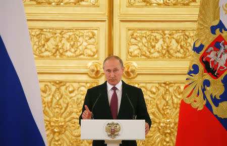 Russian President Vladimir Putin speaks during a personal send-off for members of the Russian Olympic team at the Kremlin in Moscow, Russia, July 27, 2016. REUTERS/Maxim Shemetov