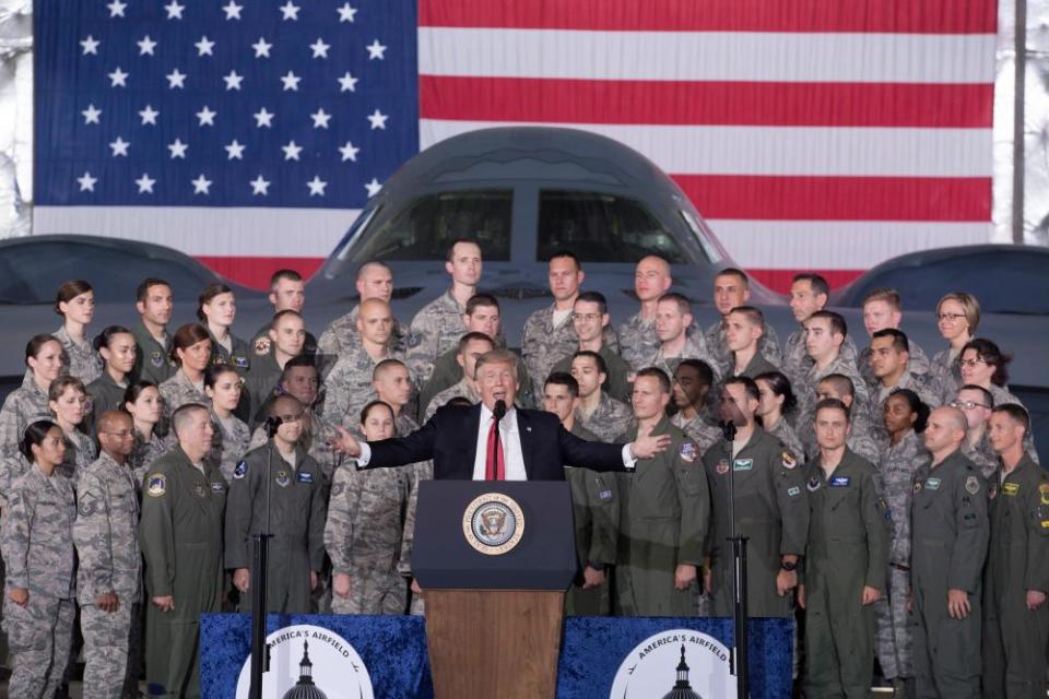 Donald Trump delivers remarks in front of military personnel and a B-2 Spirit aircraft inside a hangar at Joint Base Andrews, Maryland, on 15 September 2017.