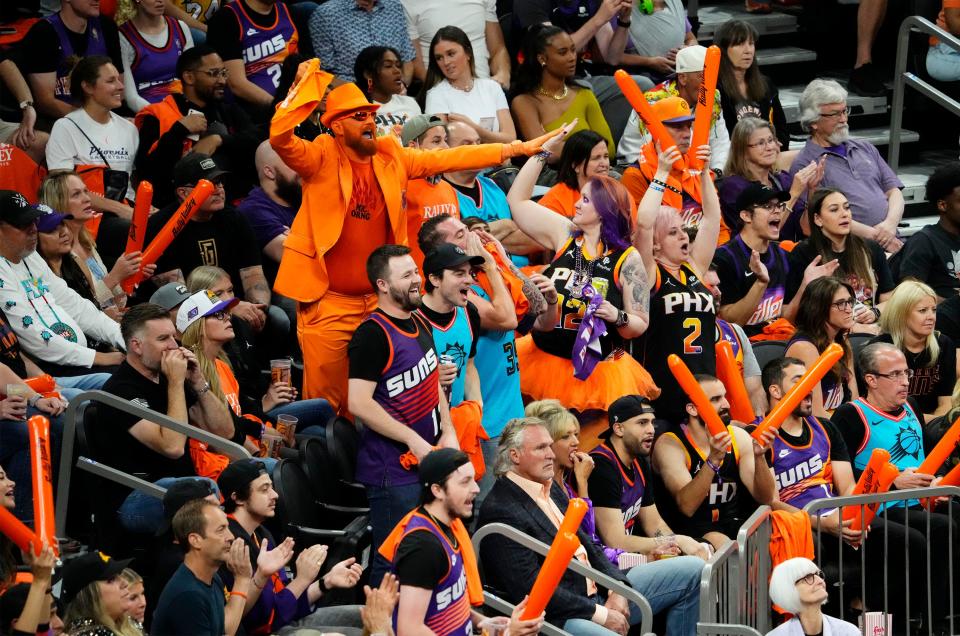 Phoenix Suns fans cheer during action against the Los Angeles Clippers in the first half of Game 5 at Footprint Center in Phoenix on April 25, 2023.