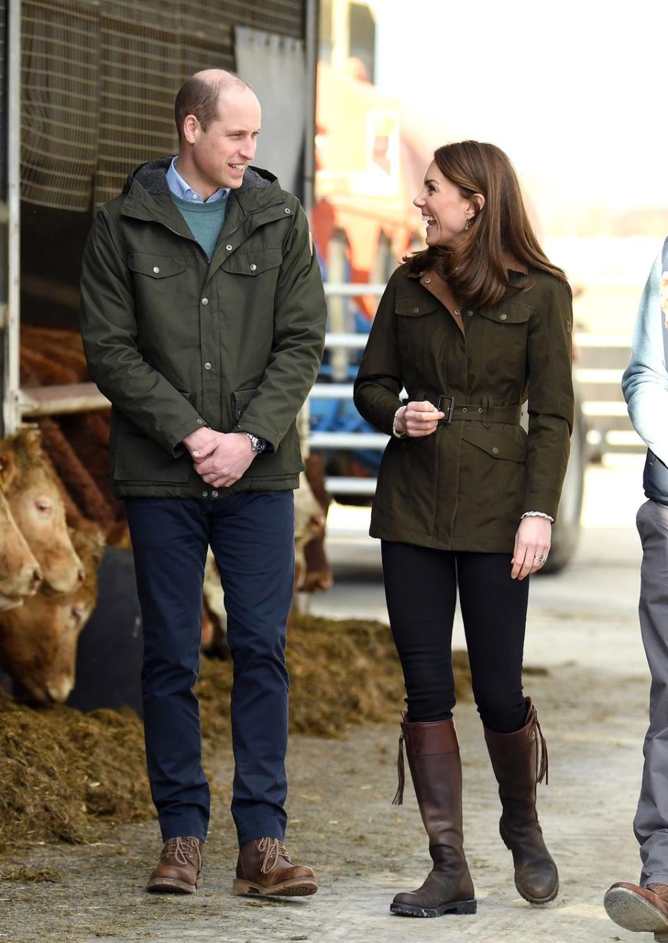 <p>For Kate's second outfit of the day, she put on something a bit more comfortable and durable. To visit Teagasc Research Farm in County Meath, Ireland, Kate swapped out her top and shoes, wearing a <a href="https://www.dubarry.com/us/women/clothing/jackets-vests/friel-utility-jacket-olive?c=42" rel="nofollow noopener" target="_blank" data-ylk="slk:Dubarry of Ireland belted, waxed jacket;elm:context_link;itc:0;sec:content-canvas" class="link ">Dubarry of Ireland belted, waxed jacket</a> and some of her <a href="https://www.penelopechilvers.com/us/long-tassel-boot-conker.html" rel="nofollow noopener" target="_blank" data-ylk="slk:favorite riding boots;elm:context_link;itc:0;sec:content-canvas" class="link ">favorite riding boots</a>. </p>