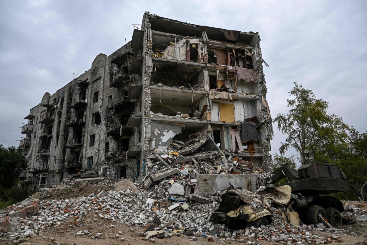 This photograph taken on September 11, 2022 shows a destroyed building in the city of Izium, Kramatorsk, eastern Ukraine, amid the Russian invasion of Ukraine. - Ukraine said on Sptember 11, 2022, that its forces were pushing back Russia's military from strategic holdouts in the east of the country after Moscow announced a retreat from Kyiv's sweeping counter-offensive. (Photo by Juan BARRETO / AFP) (Photo by JUAN BARRETO/AFP via Getty Images)