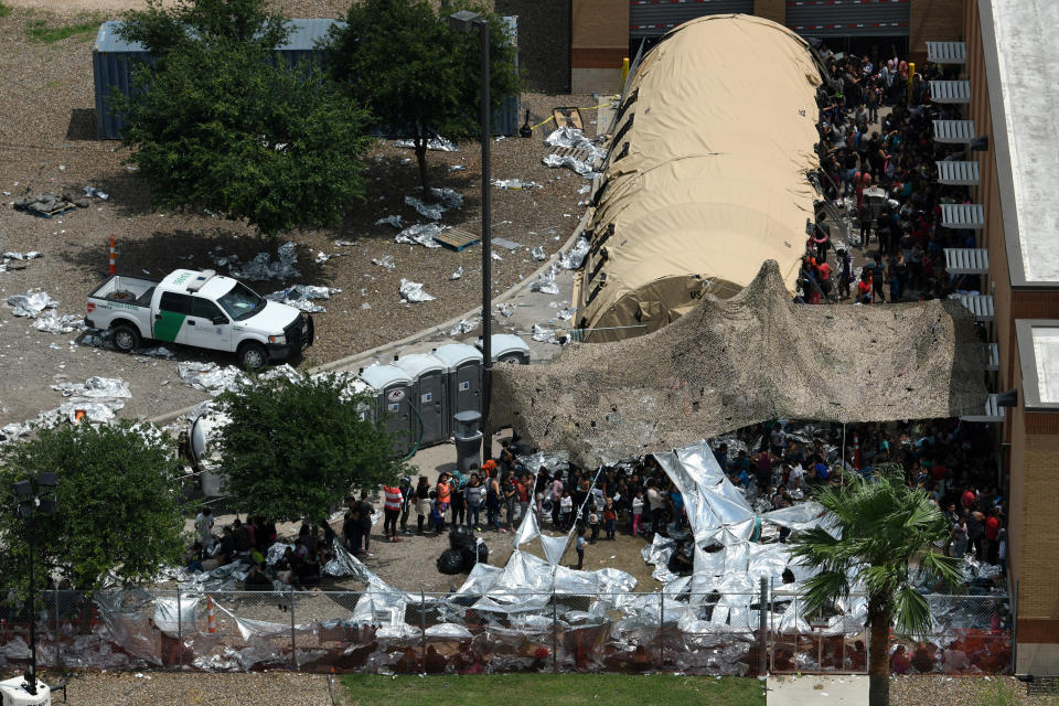 Migrants are seen outside the U.S. Border Patrol McAllen Station in a makeshift encampment in McAllen, Texas, U.S., May 15, 2019. (Photo: Loren Elliott/Reuters)