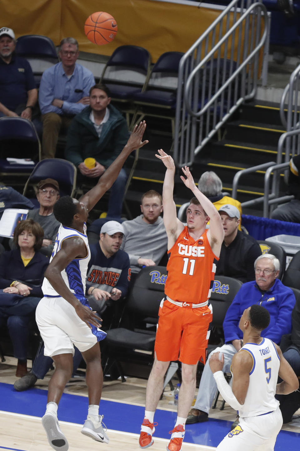 Syracuse's Joseph Girard III (11) shoots over Pittsburgh's Terrell Brown during the second half of an NCAA college basketball game, Wednesday, Feb. 26, 2020, in Pittsburgh. Syracuse won 72-49.(AP Photo/Keith Srakocic)