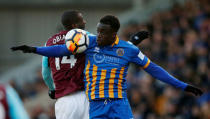 Soccer Football - FA Cup Third Round - Shrewsbury Town vs West Ham United - Montgomery Waters, Shrewsbury, Britain - January 7, 2018 Shrewsbury Town’s Arthur Gnahoua in action with West Ham United's Pedro Obiang REUTERS/Andrew Yates