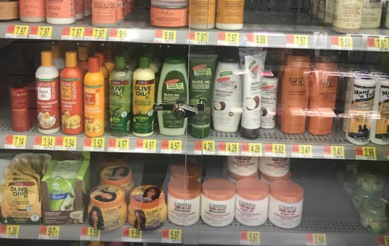 A Walmart in Long Island, N.Y., has agreed to remove the locked glass doors where black hair care products were stored, after being accused of racial discrimination. (Photo: Facebook)