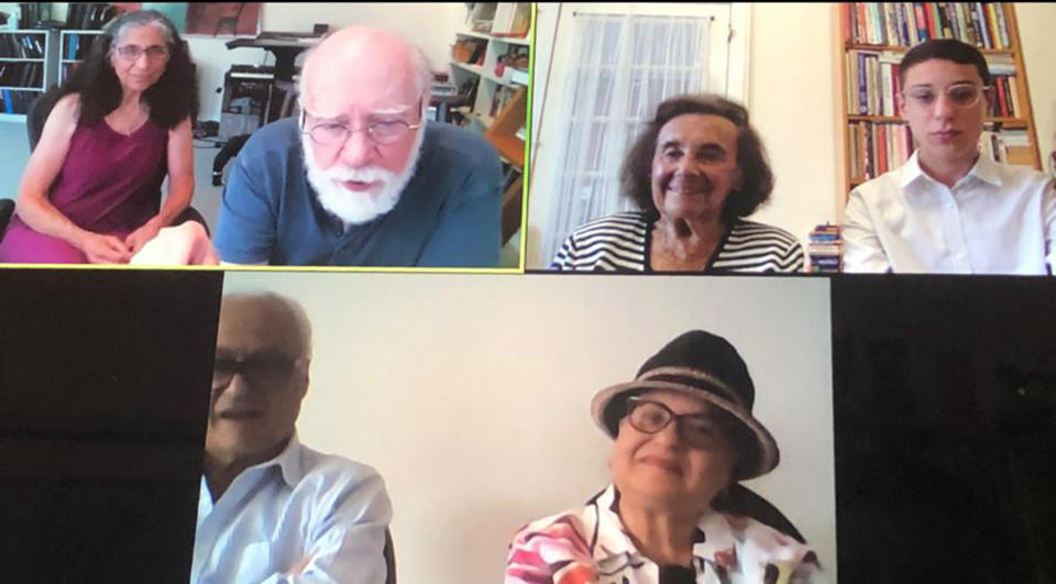 Image: Lilly Ebert and Dov Forman (right) hold a Zoom call with Arlene and Jason Schulman, descendants of the American GI that liberated Lilly during the war, along with Lilly's daughter and husband Bilha and Julian Weider. (Dov Forman)