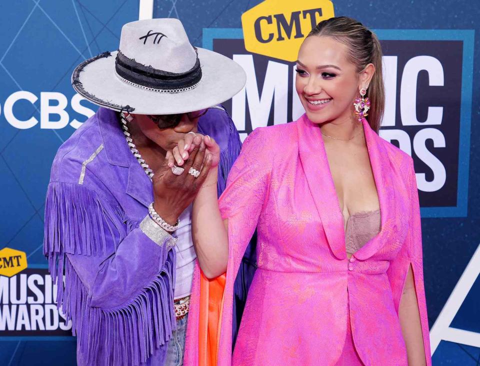 Jimmie Allen and Alexis Gale attend the 2022 CMT Music Awards at Nashville Municipal Auditorium on April 11, 2022 in Nashville, Tennessee