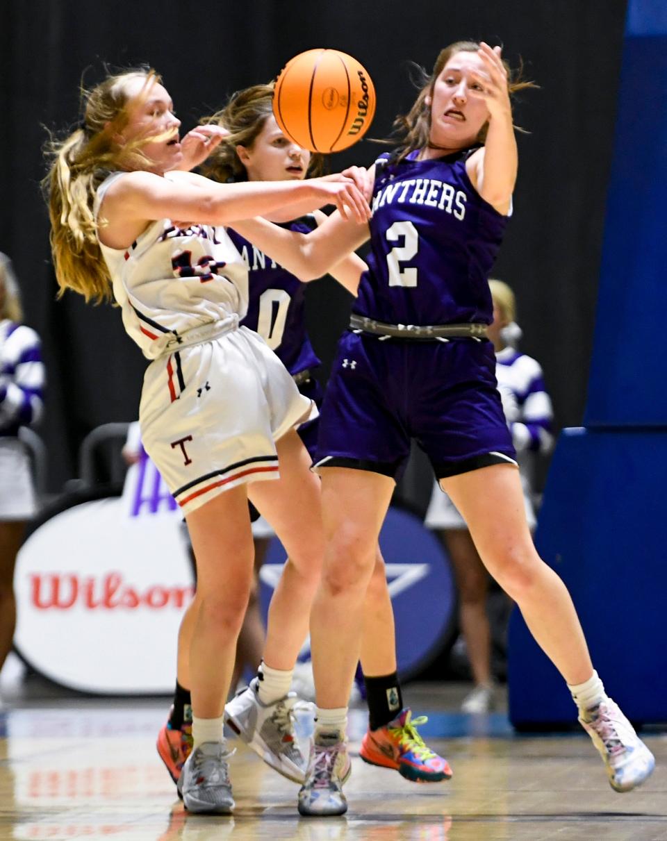 Prattville Christian’s Ella Jane Connell (2) defends against Trinity’s Emma Kate Smith (12) during the AHSAA Class 3A Southeast Regional Championship game at Garrett Coliseum in Montgomery, Ala., on Tuesday February 22, 2022.