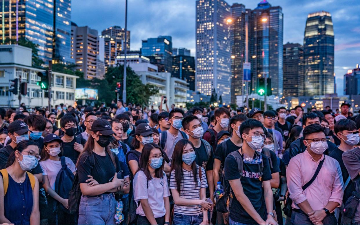 Protesters occupy a street demanding Hong Kong leader to step down after a rally against the now-suspended extradition bill  - Getty Images AsiaPac