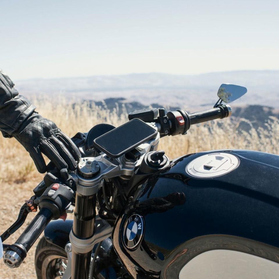 phone mounted to fork stem of a bmw motorcycle