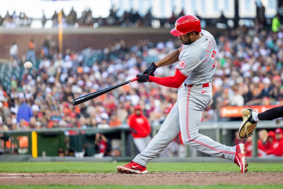 Jeimer Candelario was one of three Reds batters to be thrown out attempting to stretch a single into a double Saturday night.