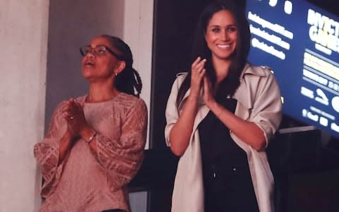 Doria Ragland joined Meghan Markle to watch Prince Harry speak at the Invictus Games closing ceremony in Toronto - Credit: Reuters